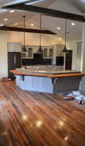 Custom Home in Clear Spring, MD built by Mt. Tabor Builders using reclaimed wood for floors and exposed beams