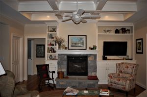 Williamsport, MD Cape Cod living room with stone fireplace in custom home built by Mt. Tabor Builders of Clear Spring, MD