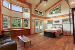 Timber frame house bedroom by Mt. Tabor Builders