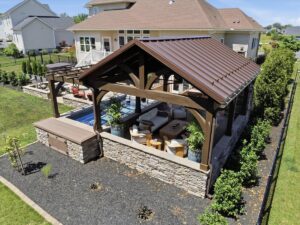 Timber frame pergola and pavilion outdoor living space project built by Mt. Tabor Builders of Clear Spring, MD in 2026.